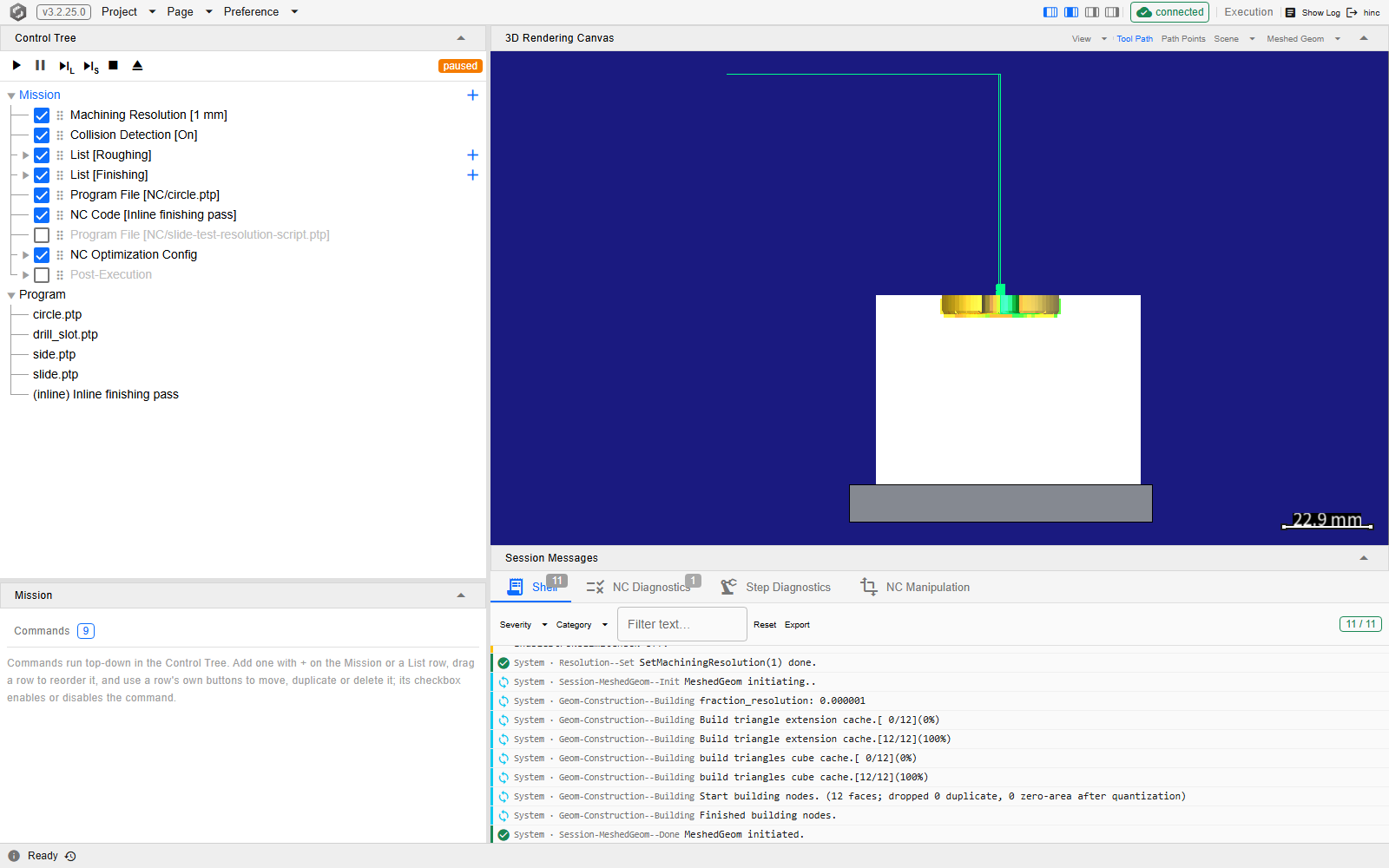 The Execution page with the run header at the top of the Control Tree pane — the six transport buttons with only the pause button greyed, and an orange paused badge at the right end — above the Mission root with its nine command rows and the Program root with its five entries, the Mission editor panel below reading Commands 9, the 3D canvas showing a gold disc cutter sunk into the top face of the white block on its grey fixture with a single thin tool path entering from the upper left and dropping straight down in green to it, the Session Messages Shell tab badged 11 and NC Diagnostics badged 1 over a list of system messages, and a footer reading Ready